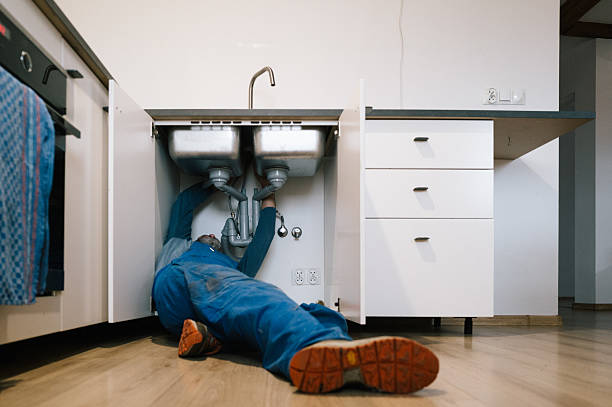 Professional Emergency Plumber technician working in Willington, CT